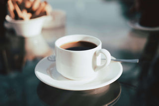 Coffee cup and fresh beans