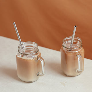 Creamy iced coffee in a mason jar